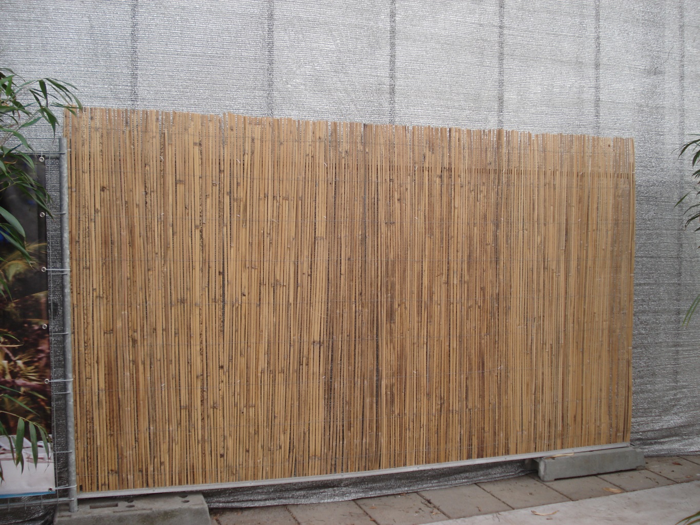 Foto van Bamboemat op bouwhek kunstofvoet en klemmen